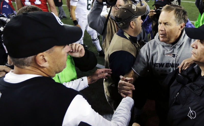 New England Patriots head coach Bill Belichick, right, shakes hands with New York Jets head coach Rex Ryan, left, after the Patriots' 29-26 overtime win in an NFL football game in Foxborough, Mass., Sunday, Oct. 21, 2012. (AP Photo/Charles Krupa) NFLACTION12; Gillette Stadium