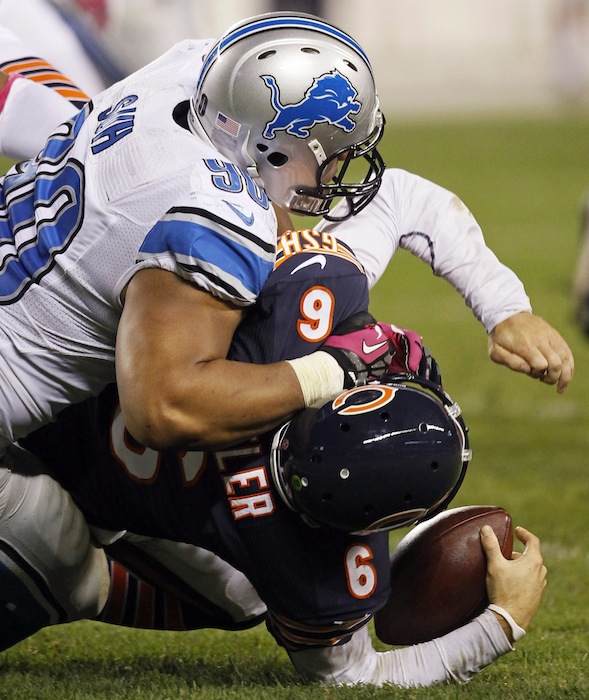 Chicago Bears quarterback Jay Cutler (6) is sacked by Detroit Lions defensive tackle Ndamukong Suh (90) in the first half of an NFL football game in Chicago, Monday, Oct. 22, 2012. (AP Photo/Charles Rex Arbogast) NFLACTION12;
