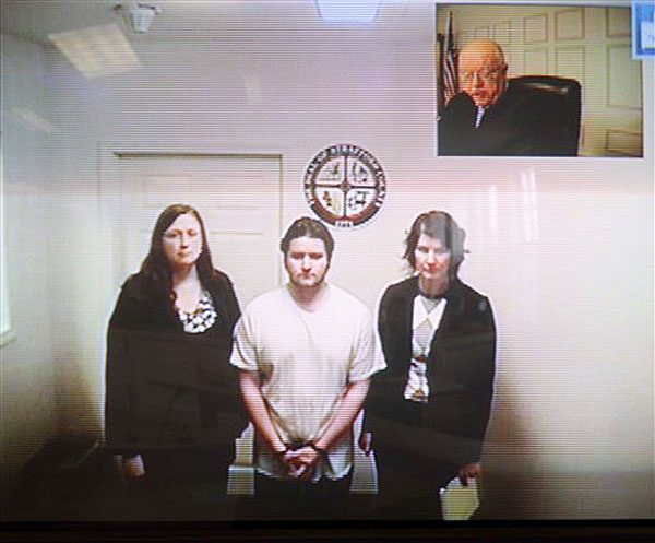 Seth Mazzaglia, bottom center, is seen during his video arraignment from the Strafford County Jail in Dover, N.H., to the district court in Dover on Monday, Mazzaglia was charged with killing Elizabeth "Lizzi" Marriott, a 19-year-old University of New Hampshire student.