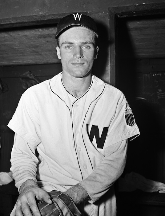 This June 3, 1947, file photo, shows Washington Senators third baseman Eddie Yost in Washington. Yost, nicknamed "The Walking Man" because of his penchant for drawing bases on balls during an 18-year major league career, has died Tuesday morning, Oct. 16, 2012, in Weston, Mass. He was 86. Yost led the AL in walks six times, including a career-high 151 in 1956. (AP Photo/HWG, File) Close-Up Looking At Camera Smiling Professional Sportsperson Sportswear