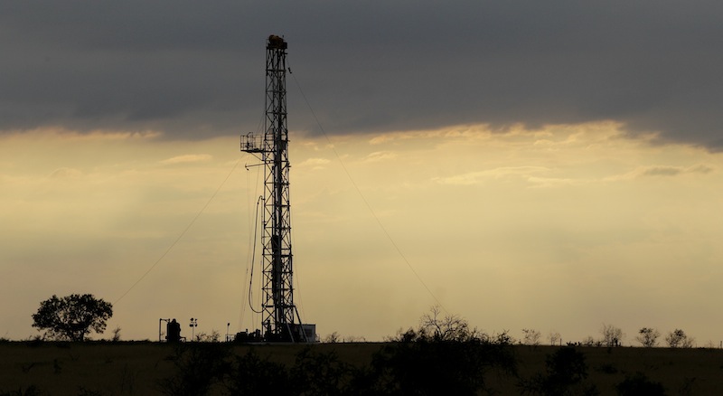 This Wednesday, May 9, 2012, file photo, shows a drilling rig near Kennedy, Texas. U.S. oil output is surging so fast that the United States could soon overtake Saudi Arabia as the world's biggest producer. U.S. production of oil and other liquid hydrocarbons is on track to rise 7 percent in 2012 to an average of 10.9 million barrels per day. It's the fourth straight year of crude increases, and this year drillers are on track to post the biggest single year gain since 1951. (AP Photo/Eric Gay, File)