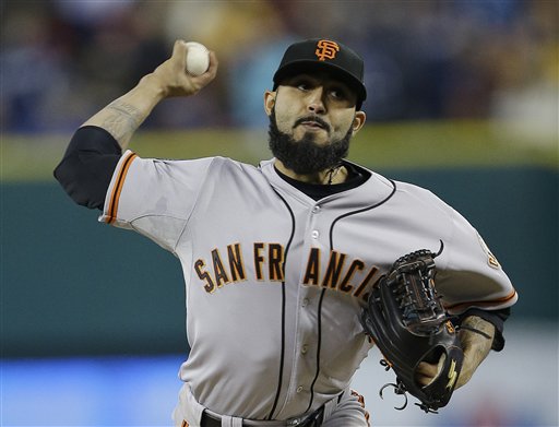San Francisco Giants' Sergio Romo throws during the ninth inning of Game 3 of the World Series against the Detroit Tigers Saturday in Detroit. MLB
