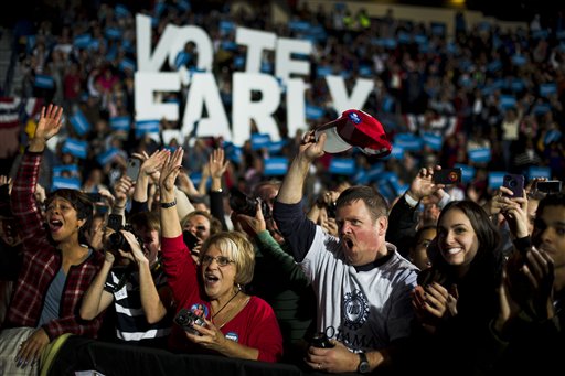 Supporters cheer for former President Bill Clinton before Vice President Joe Biden spoke at a campaign rally at the Covelli Centre, Monday, Oct. 29, 2012, in Youngstown, Ohio. (AP Photo/Matt Rourke)