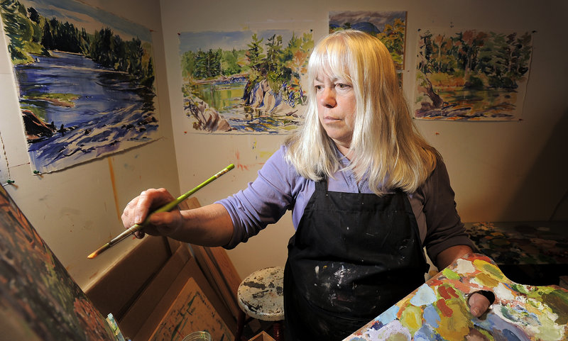 Painter Marsha Donahue operates North Light Gallery in downtown Millinocket. She plans to vote for President Obama, partly to qualify for insurance under Obama’s health care law.