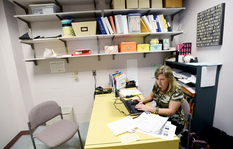 Windham Primary School teacher Julie Young shares a small office that used to be a supply and copy room on Tuesday, Oct. 2, 2012.