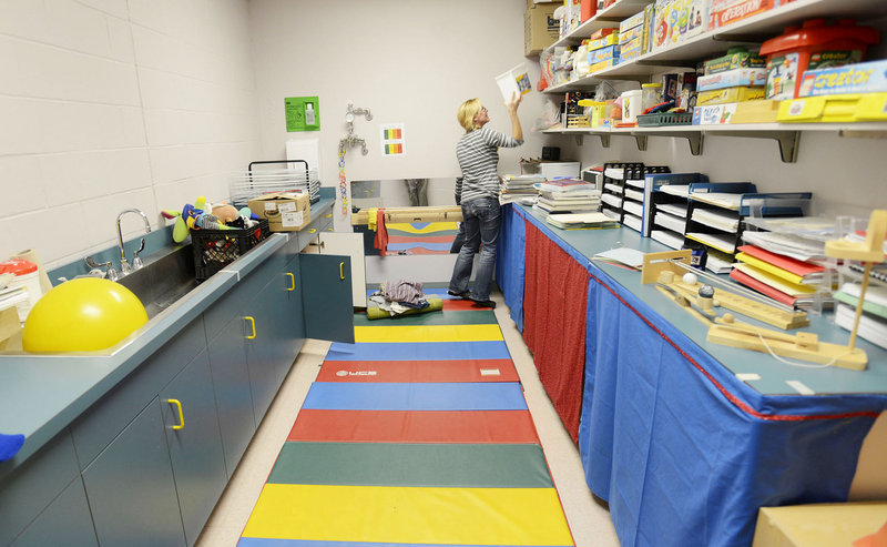 Kim Perron, an occupational therapist at the school, occupies a space that was previously used for storage and once as a darkroom by the school's art classes.