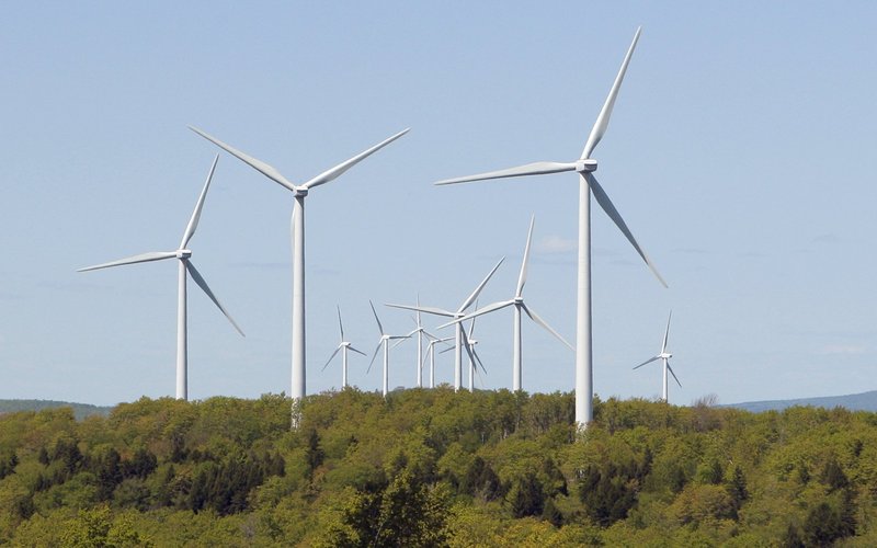 Turbines tower over the landscape at the Stetson wind farm in Danforth. The benefits of wind energy have been exaggerated, and the costs have been largely overlooked, readers say.