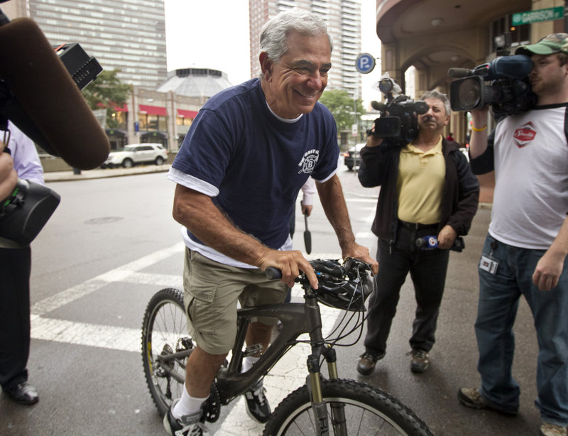 Bobby Valentine, whose tenure as the Red Sox manager came to a stop Thursday, was still smiling while drawing media attention on a Boston street.