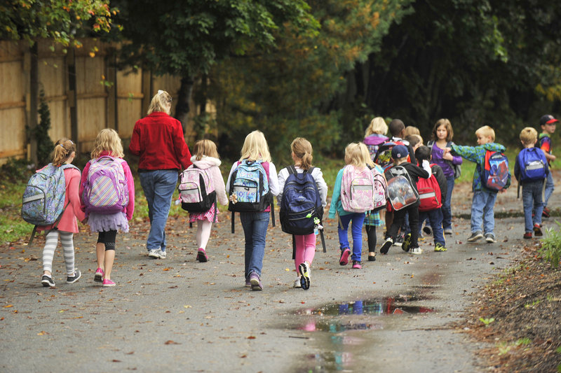 Lyseth Elementary students walk to school Friday to celebrate International Walk to School Day.