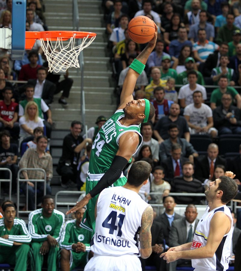 Paul Pierce goes for the dunk in a losing cause as the Celtics fell 97-91 to Fenerbahce Ulker in the NBA’s first exhibition game Friday in Turkey.