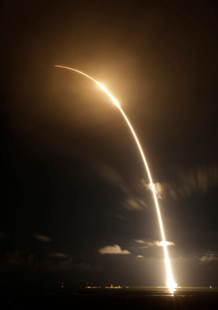 A time exposure photo shows the Falcon 9 SpaceX rocket lifting off from Cape Canaveral Air Force Station inFlorida on Sunday.
