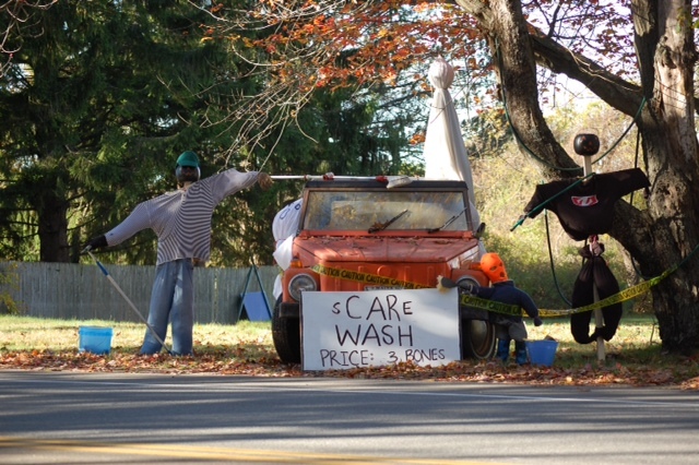At one Cape Elizabeth home, the cost of a “Scare Wash” is “3 Bones.” Several towns around southern Maine have been holding scarecrow contests.