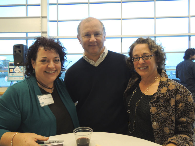 Karen Arnold, an engineer with ARCADIS and the event’s fundraising co-chair; Bill Weber, an engineer with AMEC; and Claudia Dricot, who donated photography services for the silent auction