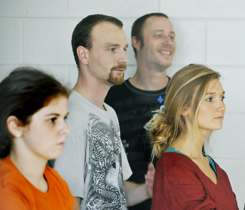 SMCC modern dance classmates including Jordan, center, and Dinsmore focus on a lesson Friday.