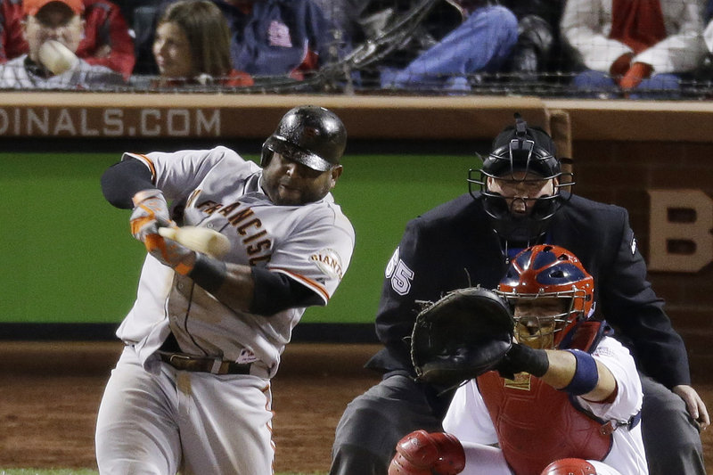Pablo Sandoval of the Giants raps a home run in the eighth inning of Game 5 Friday in the National League Championship Series. The Giants won that game 5-0, setting up Game 6 in San Francisco. The series winner will play Detroit in the World Series.