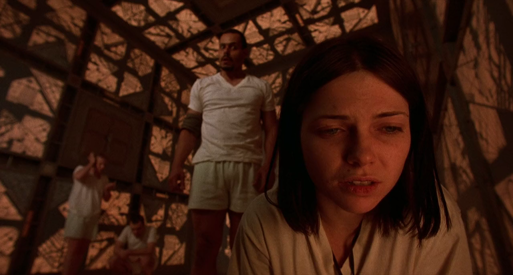 “Cube,” a 1997 release out of Canada, finds seven strangers held captive in seven identical cube-shaped rooms, some of which are diabolically booby-trapped.