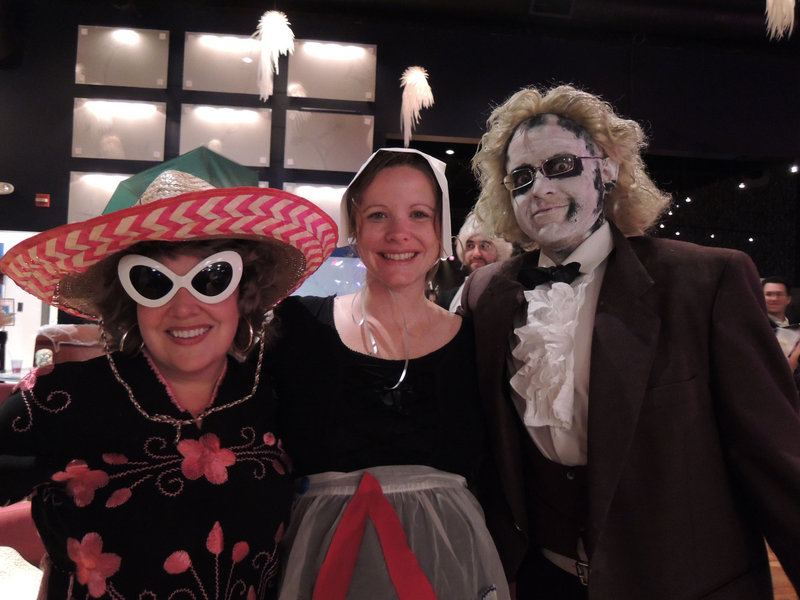 Goodwill employees Kimberly Curry of Portland, as a tourist from Mexico; Michelle Smith of Portland, as Hester Prynne from “The Scarlet Letter”; and Manny Archibald of Gray, as Beetlejuice