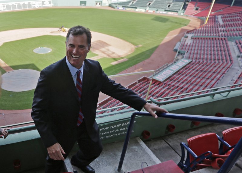 John Farrell, the new manager of the Boston Red Sox, walks through the stands Tuesday at Fenway Park. Farrell, who became the 46th manager in the club’s 112-year history, spoke glowingly of the ballpark and fans Tuesday, saying, “Boston is, in my mind ... this is the epicenter of the game.”