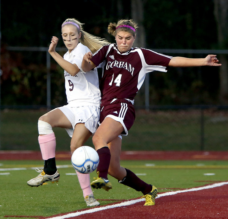Libby Andreasen of Gorham, right, competes for the ball with Tori Daigle of Thornton Academy during Thornton’s 2-0 victory Tuesday in a Western Class A quarterfinal. The second-seeded Trojans will take a 15-0 record to the semis.