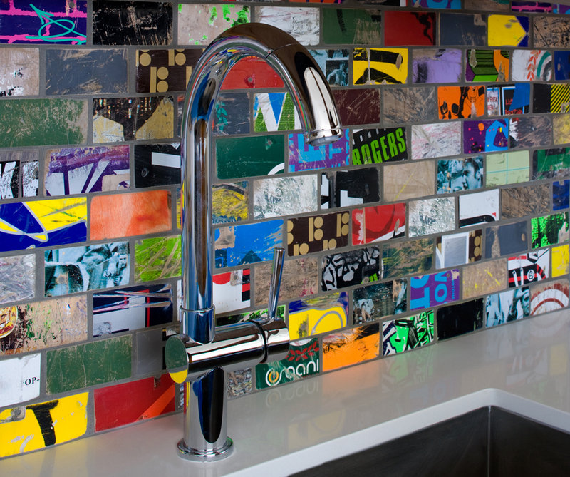 A sink backsplash made with “skate tile” hand-cut by Art of Board from recycled skate decks in Los Angeles