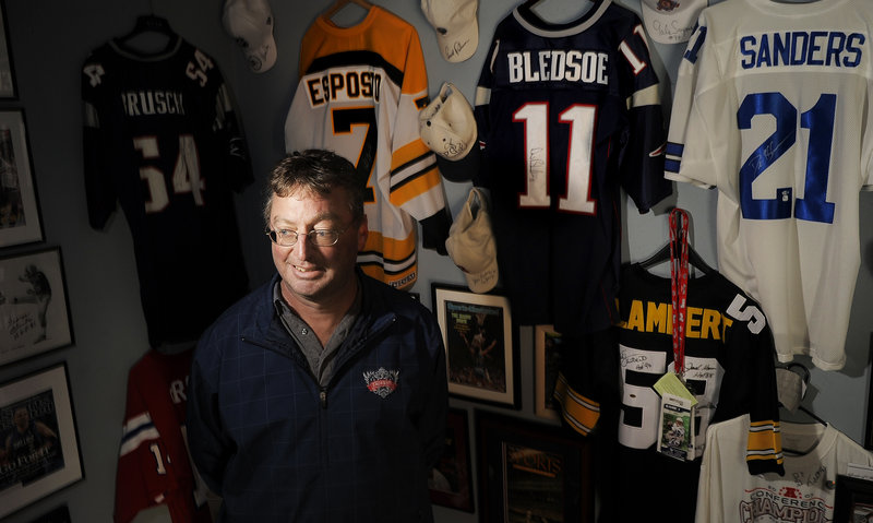 Surrounded by sports memorabilia in his Carrabassett Valley home, John Beaupre, 51, remains undecided about the presidential race: “I haven’t made the final decision.”