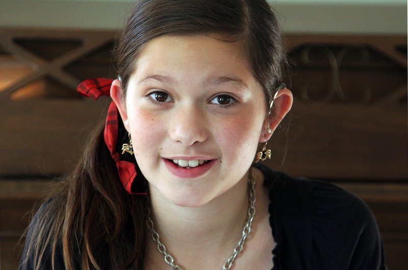 Elizabeth Merrick, 11, of Marshfield, Mass., testified last year to help children get coverage for hearing aids.