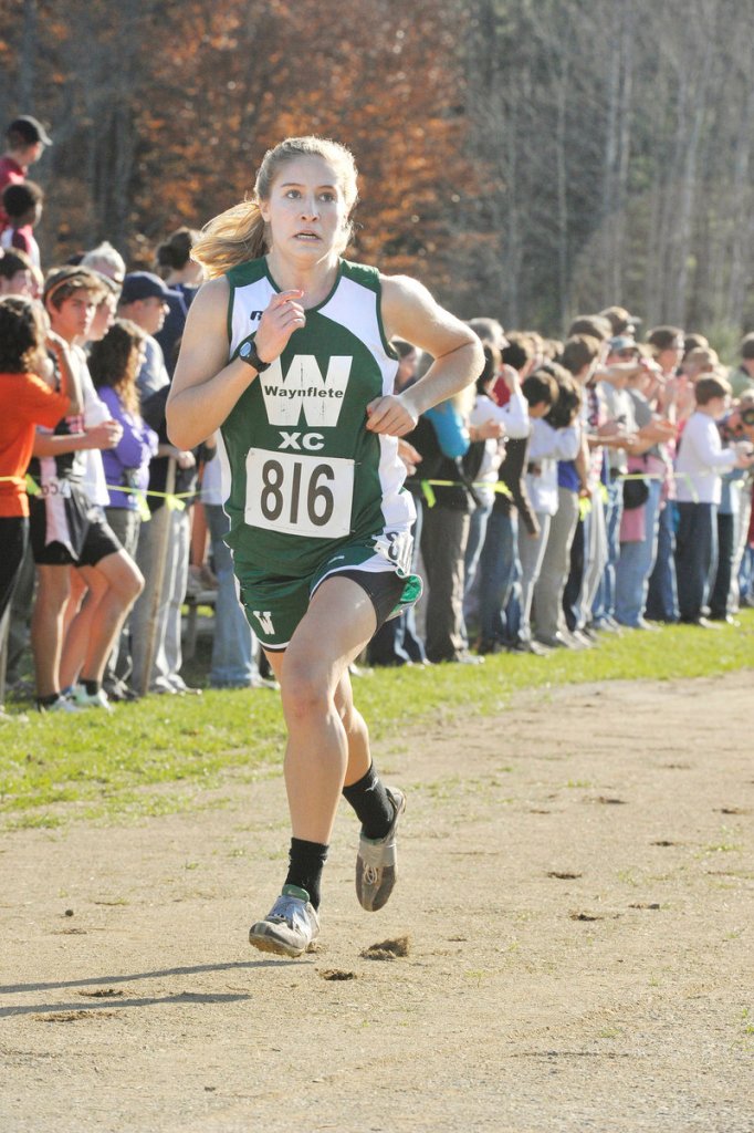 Martha Veroneau of Waynflete nears the finish line in the Class C race. The Flyers were third, one point behind second-place Orono.