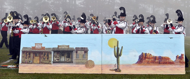 The South Portland Marching Band uses a Western theme in its performance in Old Orchard Beach on Saturday.