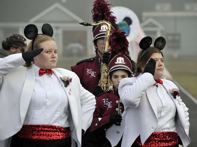 The Edward Little High School marching band leaves the field in step after its performance in Old Orchard Beach on Saturday. Each band’s performance was rated by stars, from one to five.