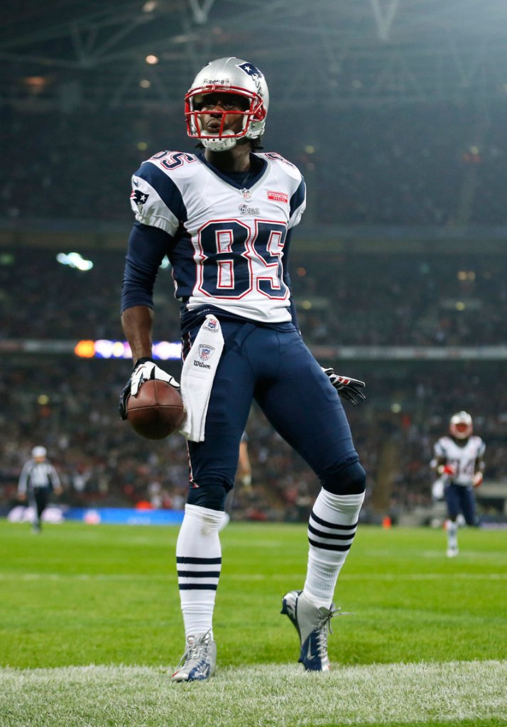 Patriots wide receiver Brandon Lloyd celebrates a touchdown reception in a 45-7 win over St. Louis at London’s Wembley Stadium.