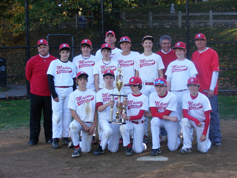 Members of the Maine Squeeze 13U baseball team, which won the New England AAU championship, from left to right: Front row – Gage Cote of Lewiston, Cameron Guarino of Falmouth, Gabe Gervais of Chelsea, Troy Johnson of Oxford and Matt Fortier of Falmouth. Second row – Ryan Kelley of West Gardiner, Matthew Crockett of Brewer, Nicolas Berube of Randolph, Ryan Sinclair of Farmingdale, Nickolas Sanborn of Monmouth and Emery Chickering of Otisfield. Back row – Coach Bob Sinclair of Farmingdale, Manager Wayne Berube of Randolph, scorekeeper Peter Guarino of Falmouth and Coach Rodney Johnson of Oxford.