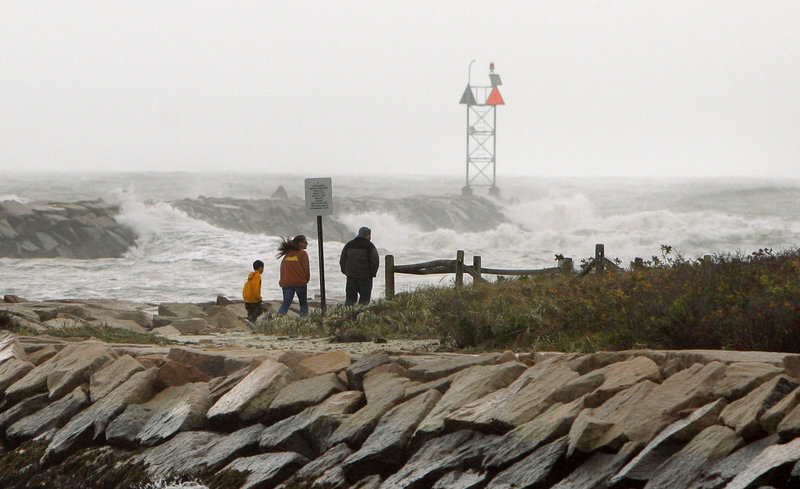 The remnants of superstorm Sandy were still kicking up substantial surf Tuesday, including at this jetty on Wells Beach.