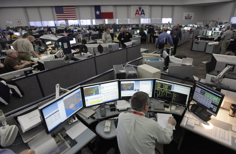 This Jan. 26 photo, shows the flight control center at American Airlines headquarters in Fort Worth, Texas. Travelers stranded by Hurricane Sandy are seeing service slowly restored across the Northeast.