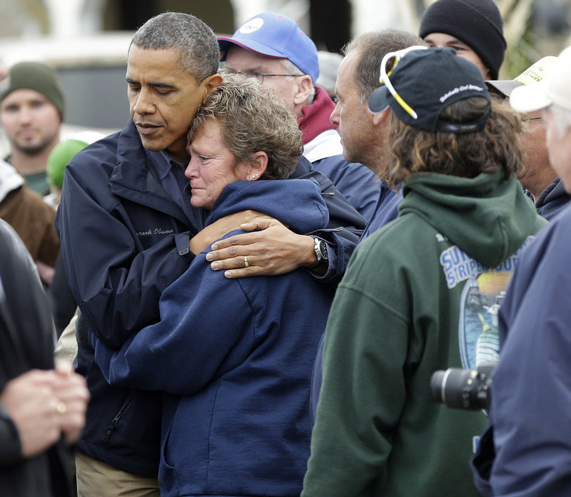 President Obama embraces Donna Vanzant during a Wednesday tour of a Brigantine, N.J., neighborhood affected by superstorm Sandy.