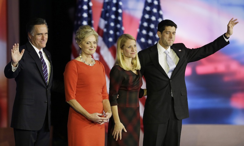 Republican presidential candidate and former Massachusetts Gov. Mitt Romney and his wife Ann stand on the stage with Republican vice presidential candidate, Rep. Paul Ryan, R-Wis., and his wife Janna after Mitt Romney conceded the race during his election night rally, Wednesday, Nov. 7, 2012, in Boston. (AP Photo/David Goldman)