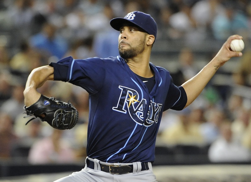 This Sept. 14, 2012 file photo shows Tampa Bay Rays starting pitcher David Price throwing against the New York Yankees in the first inning of a baseball game at Yankee Stadium in New York. Price and 2011 winner Justin Verlander are among the finalists for this year's AL Cy Young Award, Wednesday, Nov. 14, 2012.(AP Photo/Kathy Kmonicek, File)