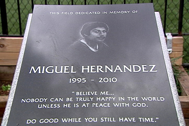 The headstone of Miguel “Mickey” Hernandez, who died of a stab wound to the chest in November 2010 at age 15. Ronald Ramos, above, one of Hernandez's friends, says gangs prowled the neighborhoods and their members were also in the schools.