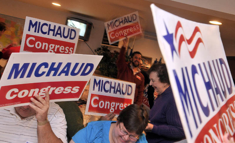 Mike Michaud supporters cheer in East Millinocket on Tuesday.