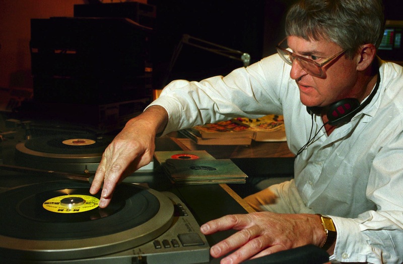 In this 1997 file photo, Toby LeBoutillier loads up a turn-table as he tries to find the right starting point for a song. Leboutillier who will host his final "Down Memory Lane" program on public radio on Friday, as MPBN Radio adjusts its schedule to accommodate more news, talk and issue-oriented programming. (AP Photo/Michael C. York)
