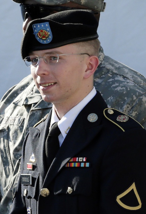 In this June 25, 2012, file photo, Army Pfc. Bradley Manning is escorted out of a courthouse in Fort Meade, Md., after a pretrial hearing. Manning, the U.S. Army private charged with sending reams of government secrets to WikiLeaks, is expected to testify during a pretrial hearing starting Tuesday, Nov. 27, 2012, at Fort Meade. Manning is seeking dismissal of all charges. He claims his solitary confinement, sometimes with no clothing, was illegal punishment. (AP Photo/Patrick Semansky, File)