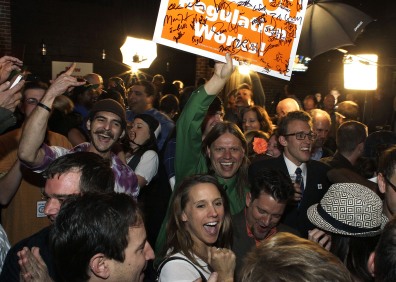 Supporters in Denver celebrate the victory of an amendment that legalizes marijuana use in Colorado on Tuesday night.