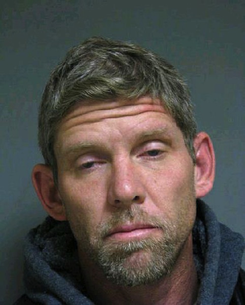 A photo released by the Vermont State Police, shows 41-year-old Mark Staake in a booking photo. Staake was arrested by Vermont police on probation violation charges Nov. 19 at the Highgate Springs border crossing. Police say they're just learning the details of what's being called a murder for hire plot involving two New Mexico men, one of whom had befriended a Vermont man serving a life sentence in a New Mexico prison for killing a Barre, Vt., girl in 2000. (AP Photo/ Vermont State Police)