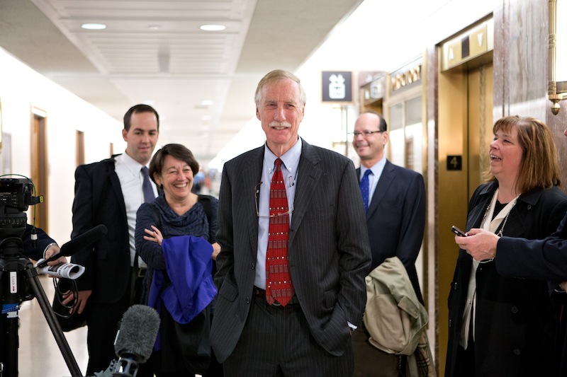 Sen.-elect Angus King, I-Maine, center, the former governor of Maine, arrives on Capitol Hill in Washington, Tuesday, Nov. 13,2012, to meet with Republican Sen. Susan Collins, R-Maine to discuss committee assignments and how they'll work together to represent Maine in the Senate. (AP Photo/J. Scott Applewhite)
