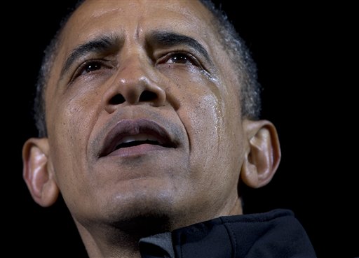 Tears run down the cheek of President Barack Obama as he speaks at his final campaign stop on the evening before the 2012 election, in the downtown Des Moines, Iowa.