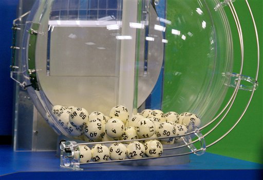 Powerball numbers are chosen in the drawing at the Florida Lottery on Wednesday in Tallahassee, Fla. The numbers drawn in the $579.9 million game were: 5, 16, 22, 23, 29 and Powerball of 6.