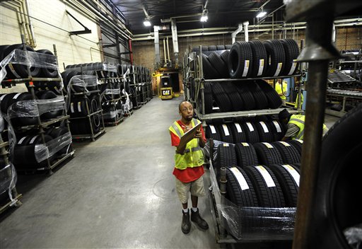 Forklift driver Clyde Boyce takes inventory recently in the warehouse at a Michelin tire manufacturing plant in Greenville, S.C. The U.S. grew at a rapid 2.7 percent in the third quarter, but Hurricane Sandy and uncertainty has likely dampened growth during the fourth quarter.
