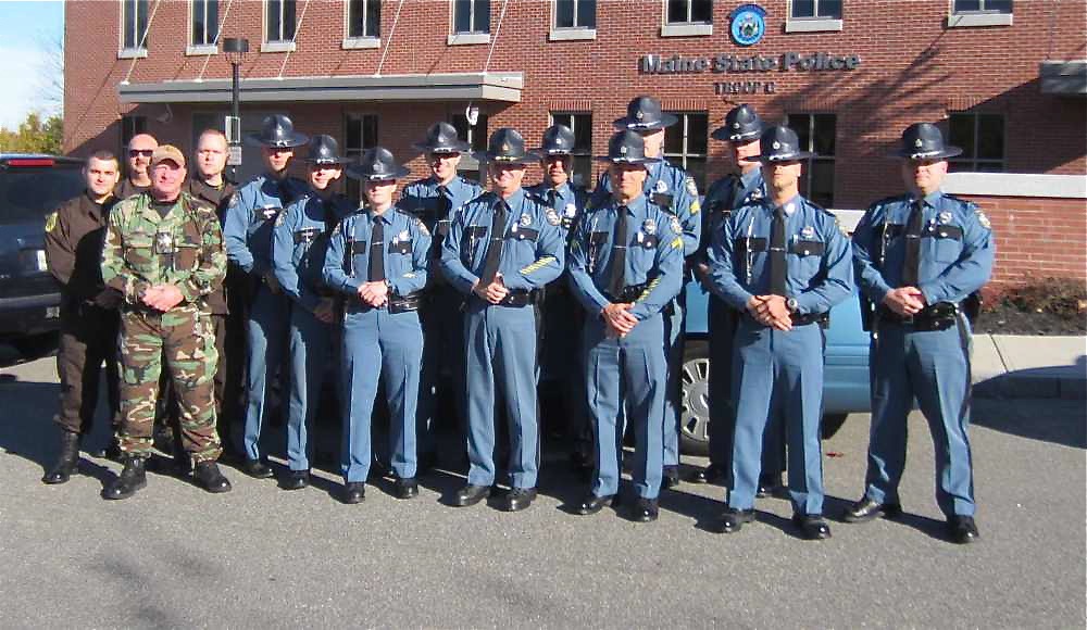 A team of police officers prepares to leave Sunday morning from the Maine Turnpike Authority offices in South Portland for an eight-day deployment to New Jersey. They are to stay at the Fort Dix Army base and begin patrolling Monday after being sworn in as New Jersey law enforcement officers.
