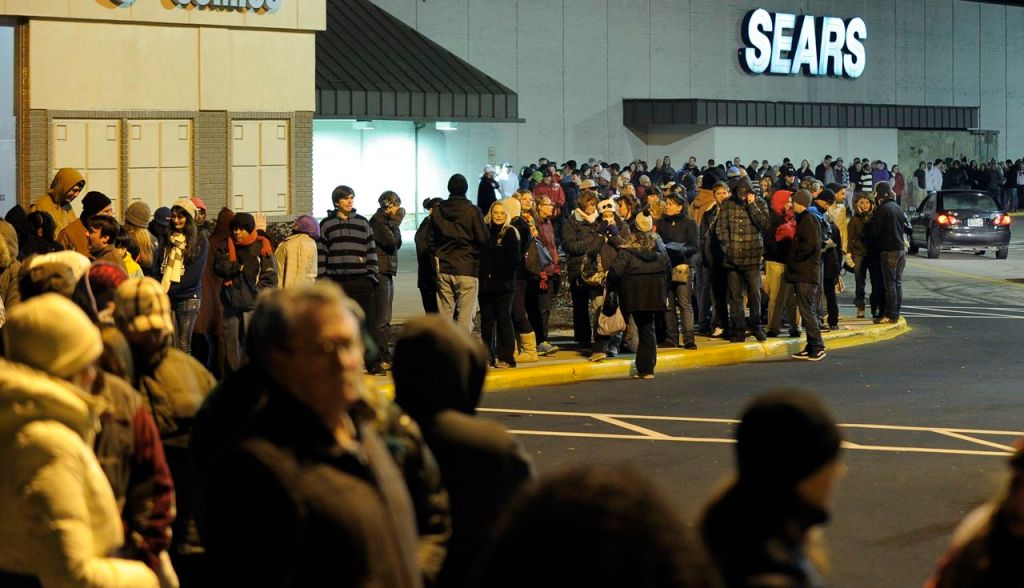 Black Friday shoppers waited in line before midnight to get into Best Buy at the Maine Mall in South Portland.