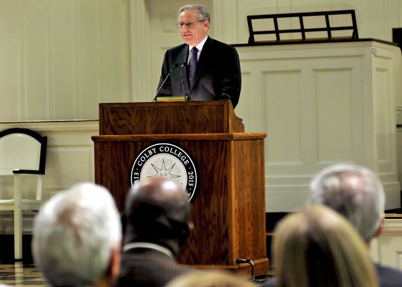 Author Bob Woodward,who as a Washington Post reporter helped unveil the Watergate scandal that brought down Richard Nixon's presidency, addresses a packed Lorimer Chapel at Colby College in Waterville on Sunday. Woodward received the college's Lovejoy Award for journalism.