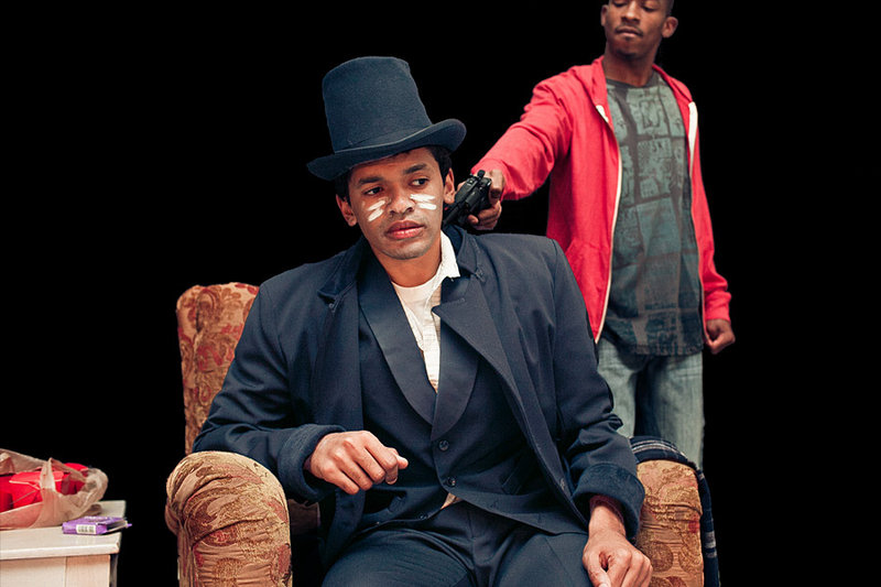 “Topdog/Underdog,” the Pulitzer Prize-winning play by Suzan-Lori Parks presented by Dramatic Repertory Company and starring Bari Robinson, front, and J.H. Smith III, continues through Sunday at the Studio Theater at Portland Stage Company.